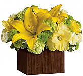 Send your get well wishes with a stylish arrangement of yellow liles, gladioli and carnations in a natural bamboo vase.