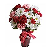 Send that special woman in your life a bouquet of Hugs and Kisses. Affordable flowers for delivery across Canada.
