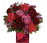 Teleflora's Ruby Rapture Bouquet is a pretty arrangement of pink roses, red spray roses and hot pink carnations with raspberry statice. Same day delivery across Canada.