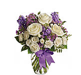 A pretty arrangement of fresh flowers in a glass vase, perfect for Mother's Day. Delivery across Canada with Canada Flowers.