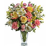 A pretty springinspired bouquet of pink, white and yellow blooms for Mother's Day.
