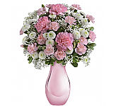 A pretty and affordable bouquet of pink and white blooms in a pink vase, perfect for Mother's Day.
