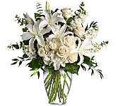 Teleflora's From the Heart Bouquet for sympathy gift giving across Canada. White roses, white hydrangea, white lilies and white stock are mixed with assorted greenery. Beautiful.
