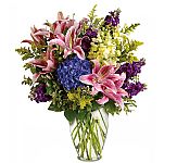 Let the family know you are thinking of them with this beautiful sympathy bouquet by Teleflora. Available same day across Canada.