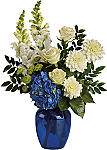 Teleflora's Ocean Devotion brilliant blue and white bouquet perfect for your special someone.