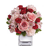 Teleflora's Love That Pink Bouquet is a beautiful combination of pink blooms with red spray roses in a designer Teleflora cube vase. Same day delivery across Canada with Canada Flowers.