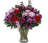 Lavish bouquet of reds, pinks and purples, roses, daisies, alstroemeria and stock flower and more! Canada Flowers original design!