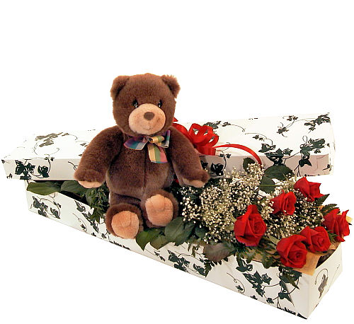 roses and a teddy bear
